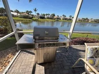 View of patio featuring a water view