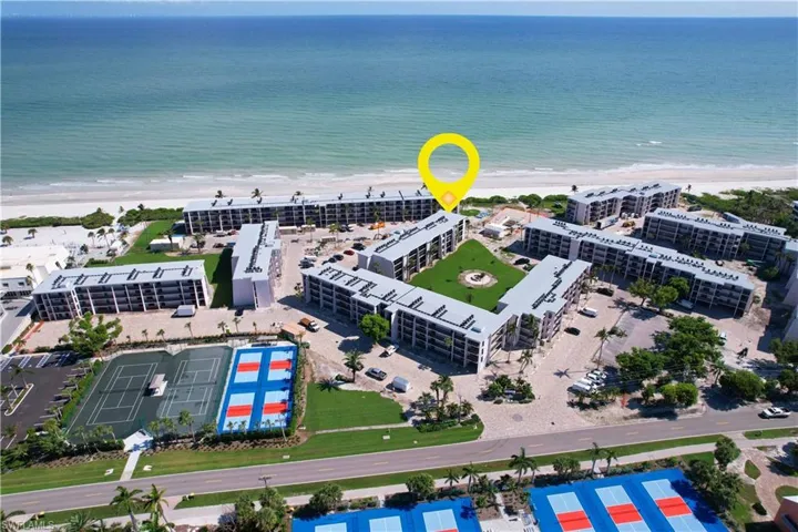 Bird's eye view with a beach view and a water view