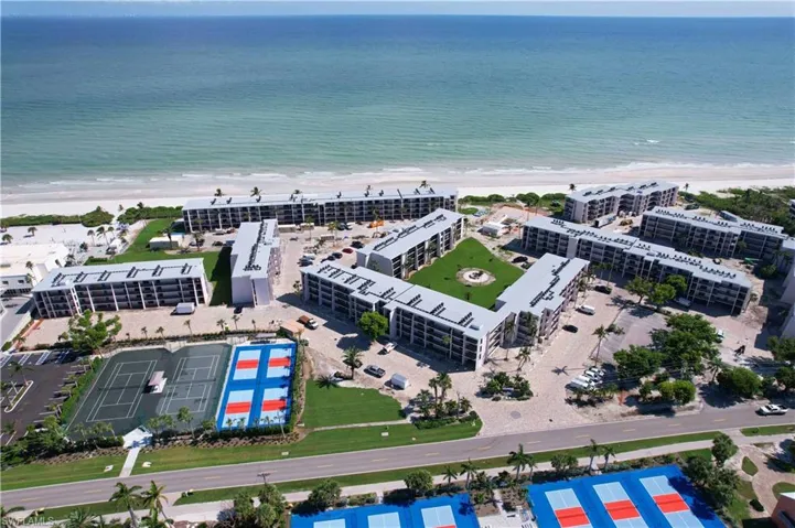 Aerial view with a view of the beach and a water view
