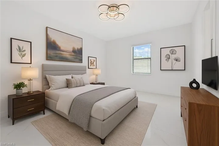 Bedroom featuring baseboards