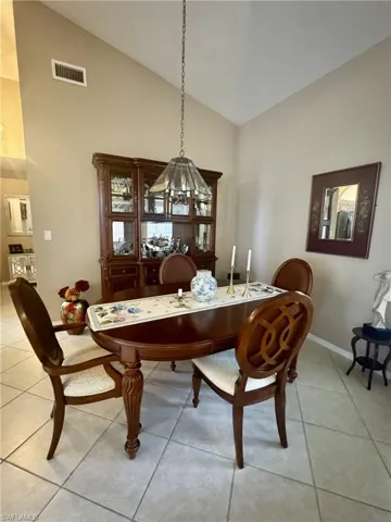 Dining area with vaulted ceilings