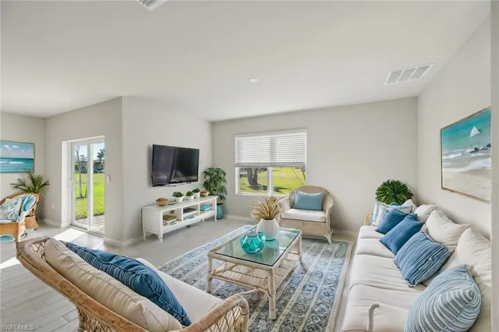Living area featuring baseboards