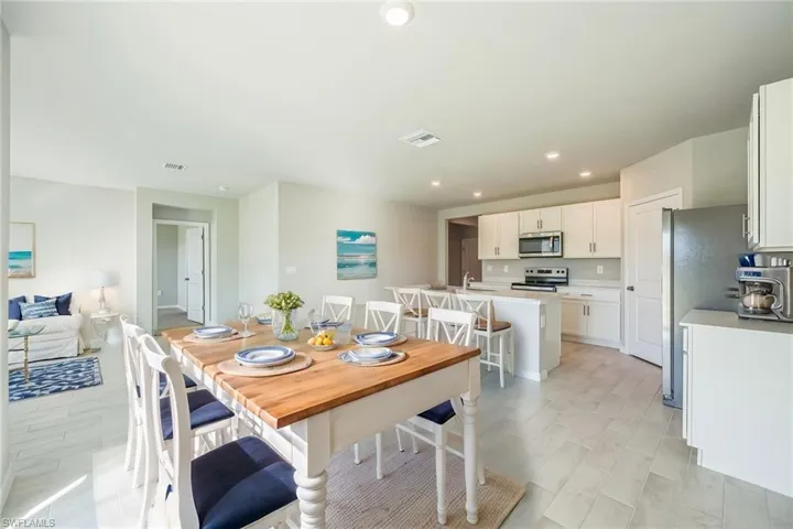 Dining area featuring recessed lighting and wood finish floors