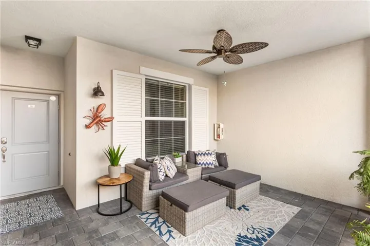 View of patio / terrace featuring ceiling fan and an outdoor hangout area