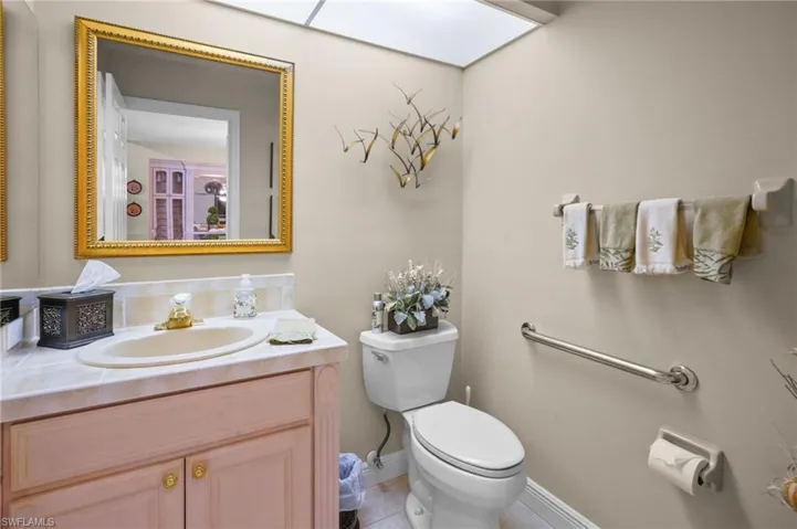 Bathroom with vanity and a skylight