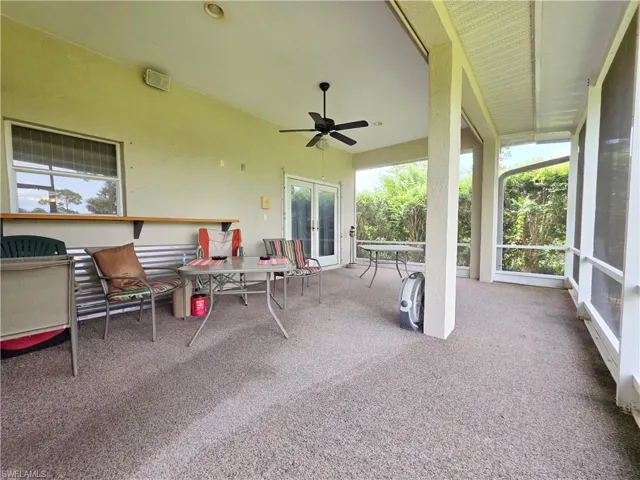 View of patio featuring a ceiling fan