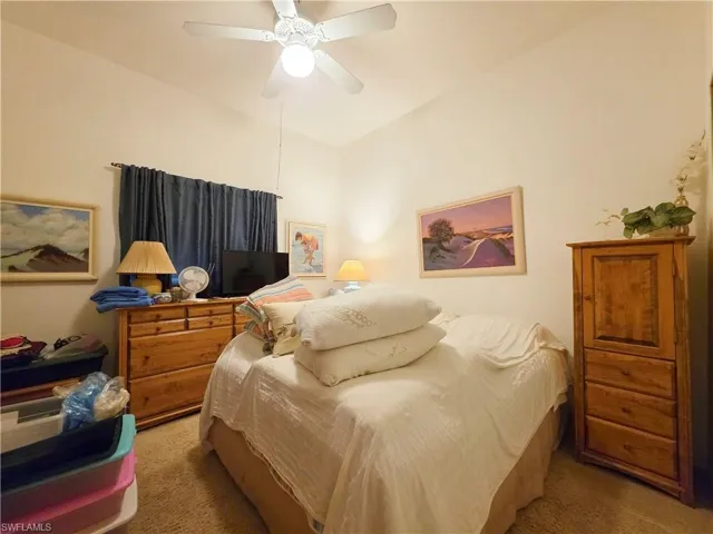 Bedroom featuring carpet floors and ceiling fan