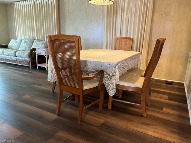 Dining space featuring dark hardwood / wood-style floors