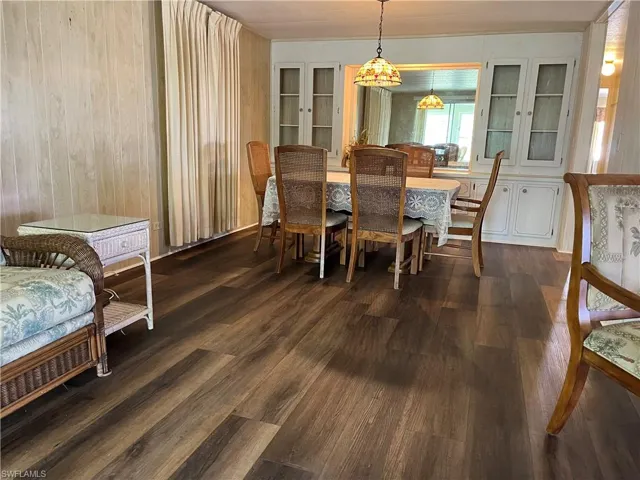 Dining space featuring dark hardwood / wood-style floors