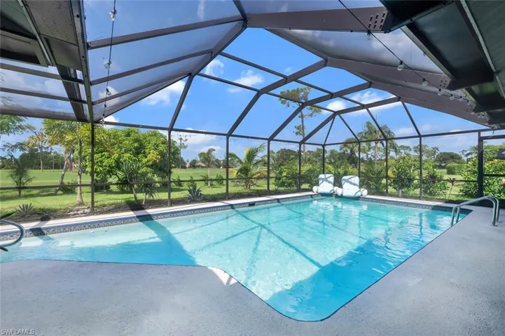 Enjoy sunsets from your southwest-facing pool with tranquil views of two lakes. Outdoor lanai includes a convenient half bath, and there’s room to add a fence all while watching eagles soar overhead.