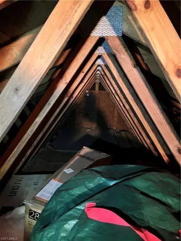 spacious garage attic storage 30X8 perfect for seasonal items, holiday decor, and extra space keep your Florida home clutter free