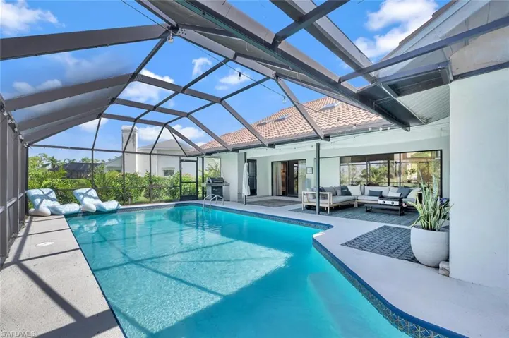 Enjoy sunsets from your southwest-facing pool with tranquil views of two lakes. Outdoor lanai includes a convenient half bath, and there’s room to add a fence — all while watching eagles soar overhead.