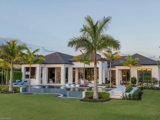 Back of house in Naples FL with resort style pool