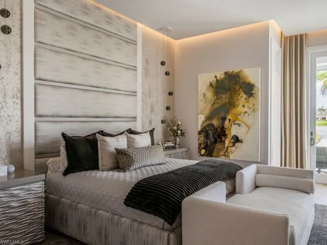 Primary bedroom with custom upholstery headboard