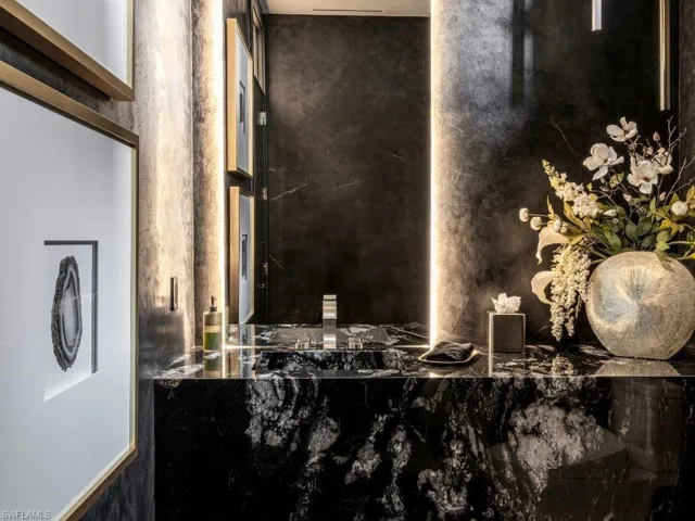 Powder bathroom, custom marble vanity with matching floor
