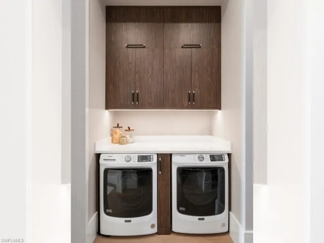 Master laundry (2) room directly adjacent to master closets with storage space for luggage.