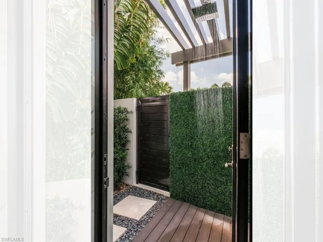 Outdoor shower off primary shower