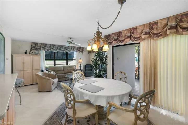 Dining space with a ceiling fan