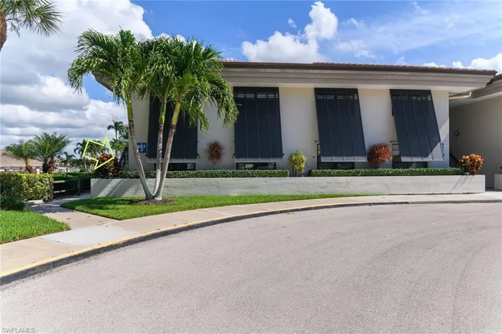 View of front facade featuring stucco siding