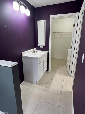 Dressing area in Master Bedroom.  Master Closet beyond.