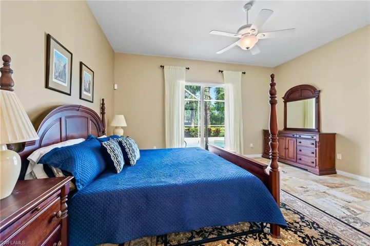 28864 Yellow Fin Trail Bonita Springs FL 34135 - Owner's bedroom with slider access to pool deck