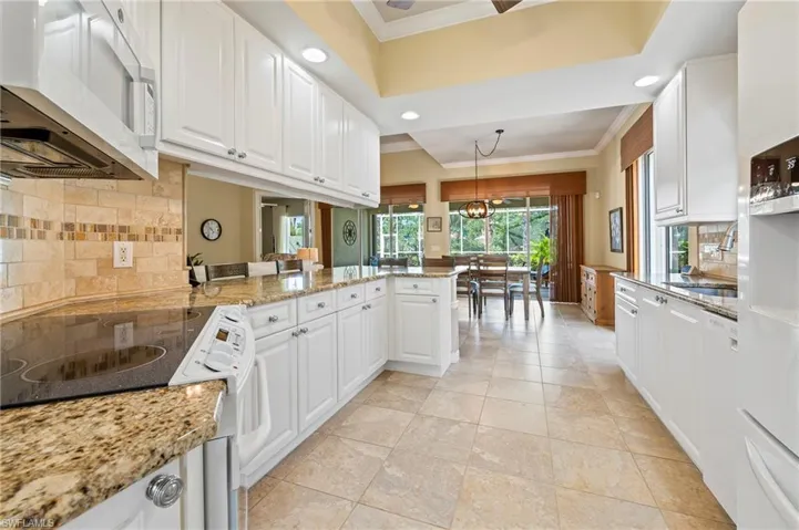 28864 Yellow Fin Trail Bonita Springs FL 34135 - Kitchen features recessed lighting and a ceiling fan for when things get too hot in the kitchen!!