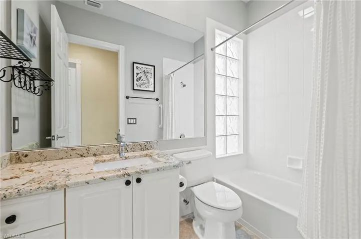 28864 Yellow Fin Trail Bonita Springs FL 34135 - Bath 2 with glass block window that allows light but keeps your privacy