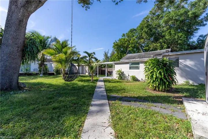 View of front of home featuring a front lawn