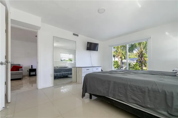 Bedroom featuring light tile patterned floors