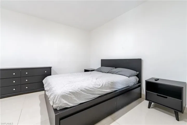 Bedroom featuring light tile patterned floors