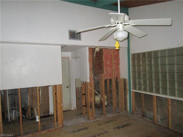 2 closets and door to Bathroom