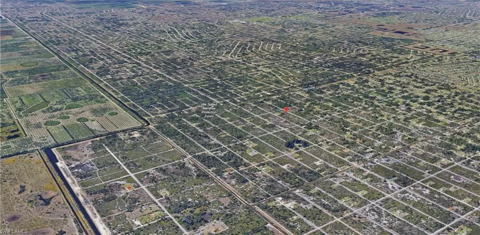 Aerial view of property and surrounding area