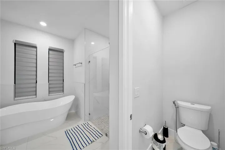 Bathroom with independent shower and bath and toilet