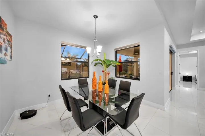 Dining area with a chandelier