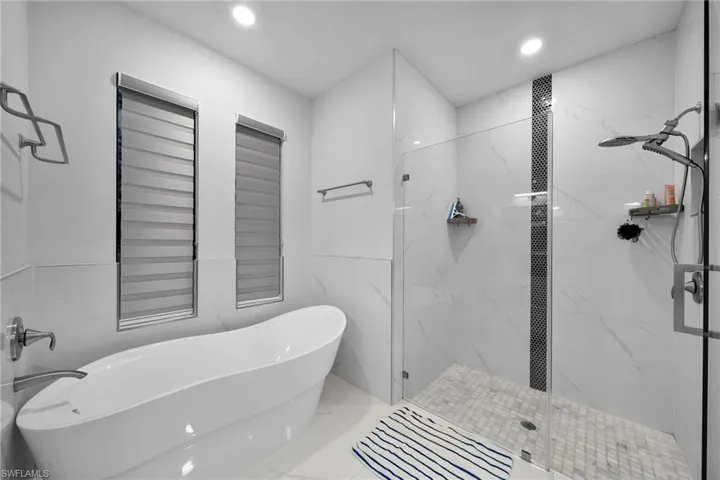 Bathroom with independent shower and bath