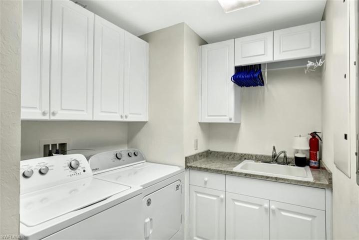 Utility Room.  Newer washer and dryer.