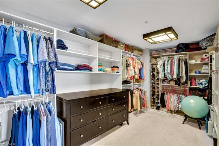 Primary Bedroom walk-in closet.