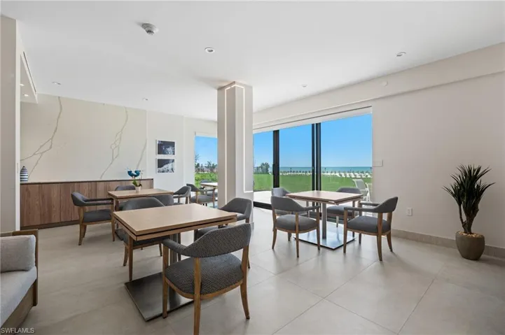 Dining area with plenty of natural light and recessed lighting
