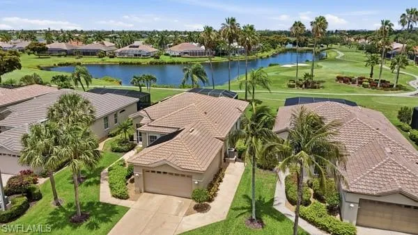 Golf Cart Garage Entrance to the Right.  Home is Located on the Lake and the 7th Fairway.