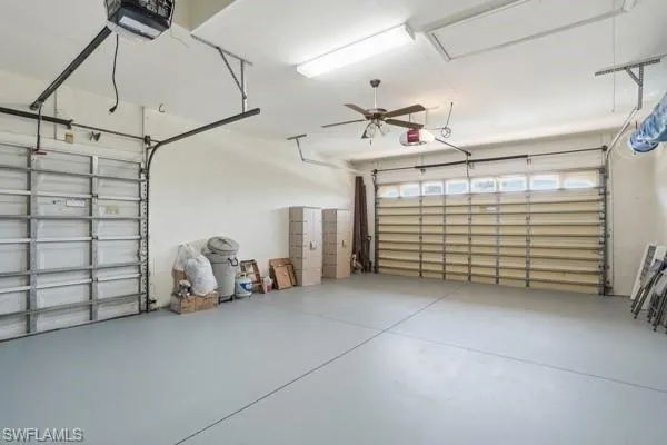 Garage with Golf Cart Entrance and Epoxy Flooring