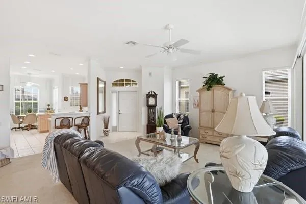 Entry Opens to the Living Room.  Kitchen with Breakfast Bar and Kitchen Nook.