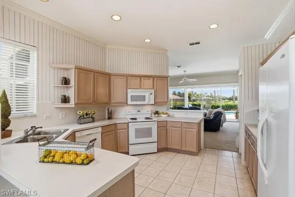 Kitchen with Breakfast Bar to the Living Room