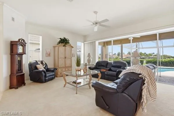 Living Room with Sliders to the Pool.