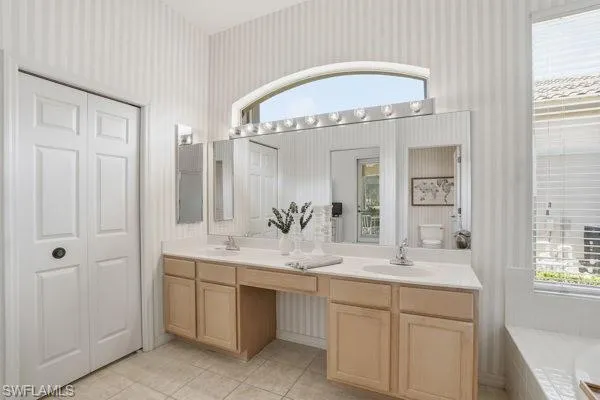 En Suite Bath with Dual Sinks and Walk-In Closet