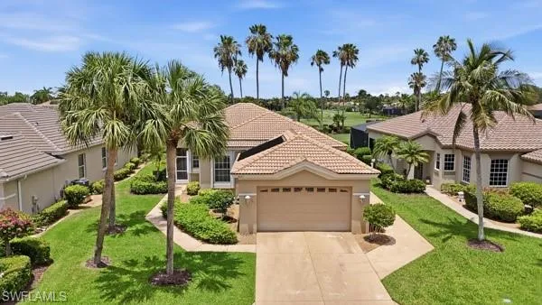 Single Family Villa Home with Tile Roof, Golf Cart Garage Entrance, Pool.