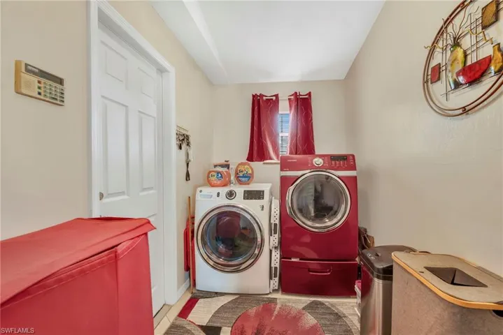 Laundry room with separate washer and dryer