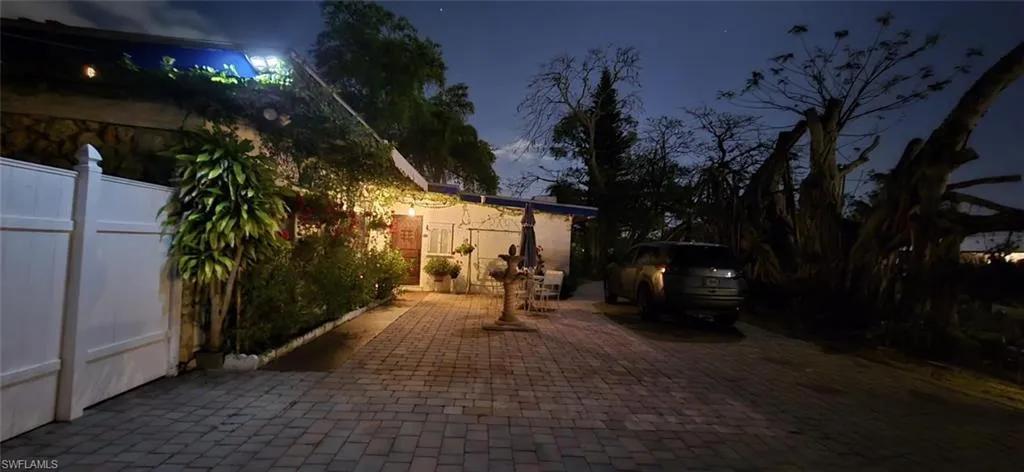 View of property exterior at night