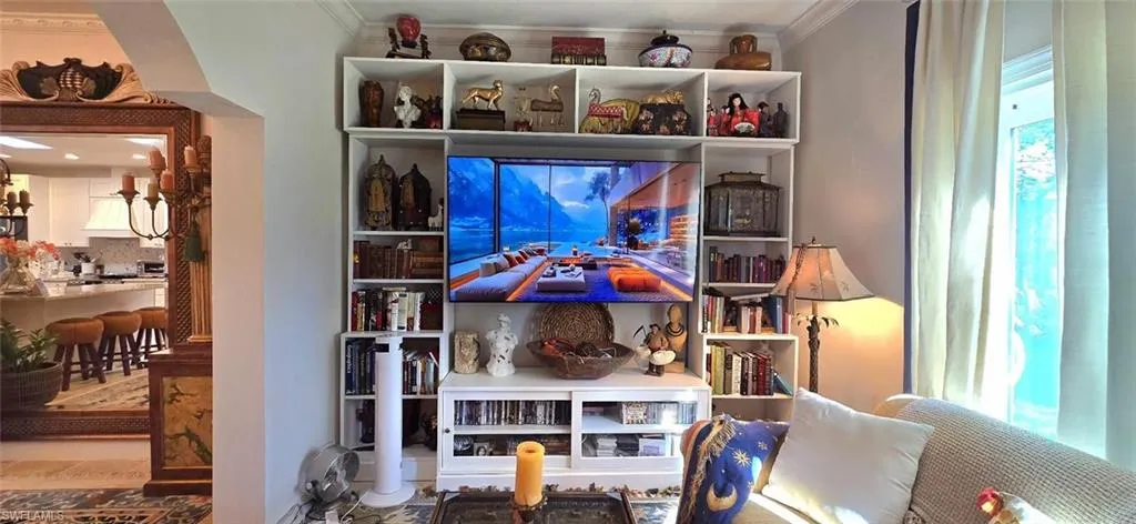 Detailed view of ornamental molding and premium range hood