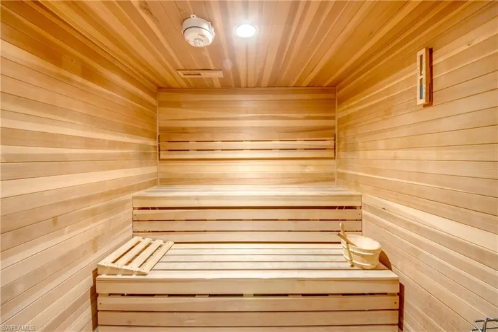 Relaxing sauna / steam room with wooden walls and wood ceiling