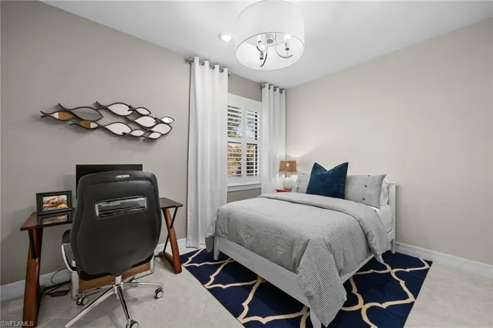 Bedroom with a chandelier